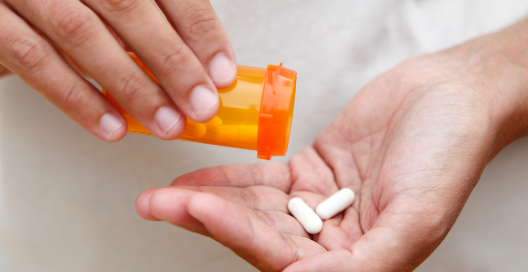 pills cupped in hands